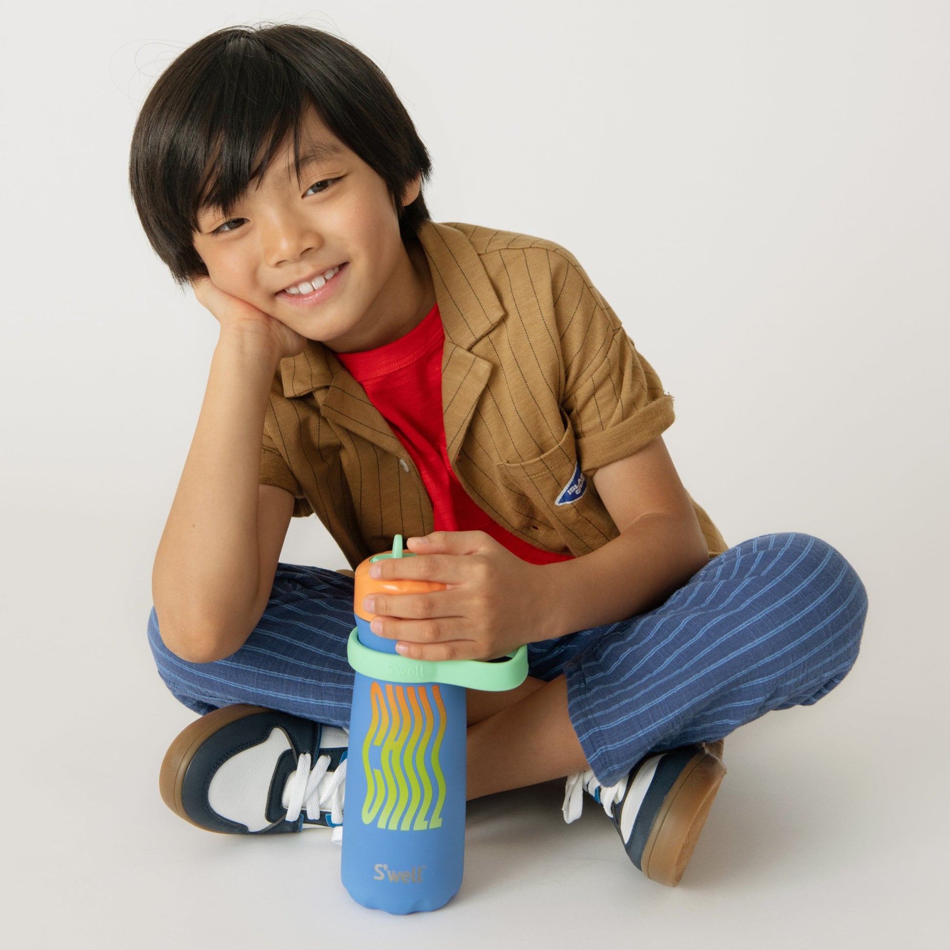 traveler-with-flip-straw-lid-16oz-h3 Swell-Kids-Water-Bottle-Traveler-16oz-Blue-Chill-Lifestyle.jpg